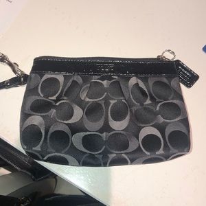 Coach Black wristlet bag.